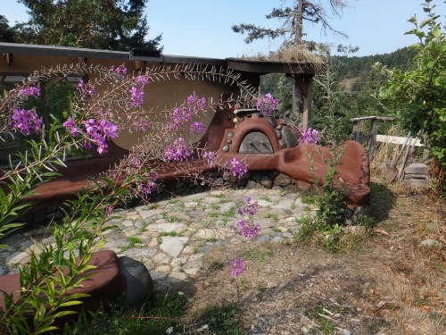 Our cob oven and cob benches have been repaired and they look fantastic!